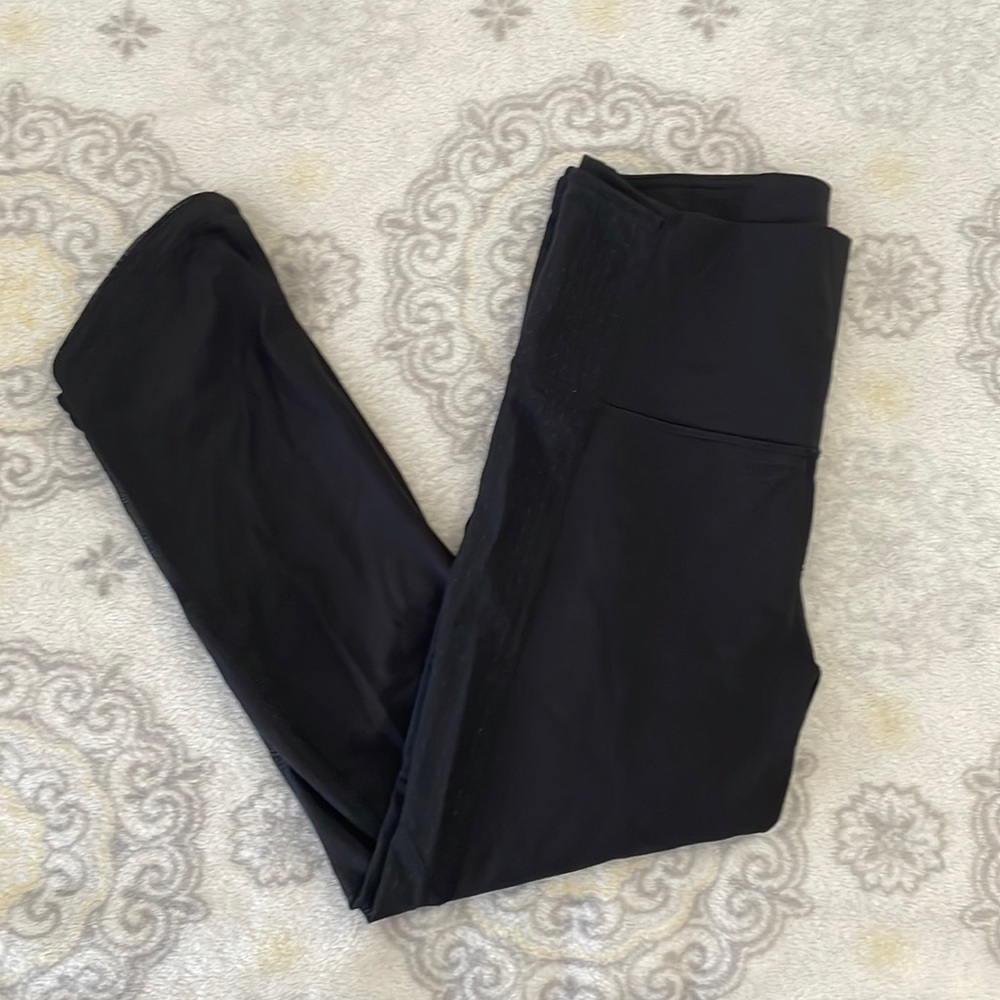 Lululemon Black Mid Rise Cropped Leggings with Mesh On Legs